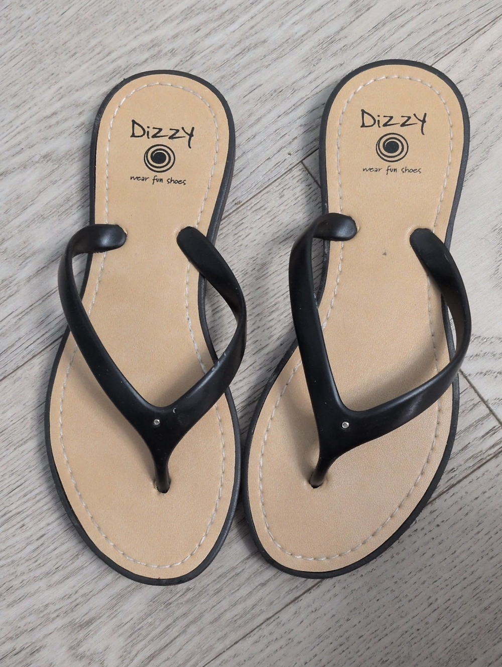 Dizzy Black Thong Sandals with Tan Footbed